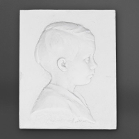 Paire de profil d’enfant en plâtre, XXème siècle.