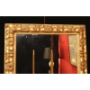 Miroir en bois et stuc doré du XIXème siècle d'époque Napoléon III. Miroir en bois et stuc doré du XIXème siècle d'époque Napoléon III.