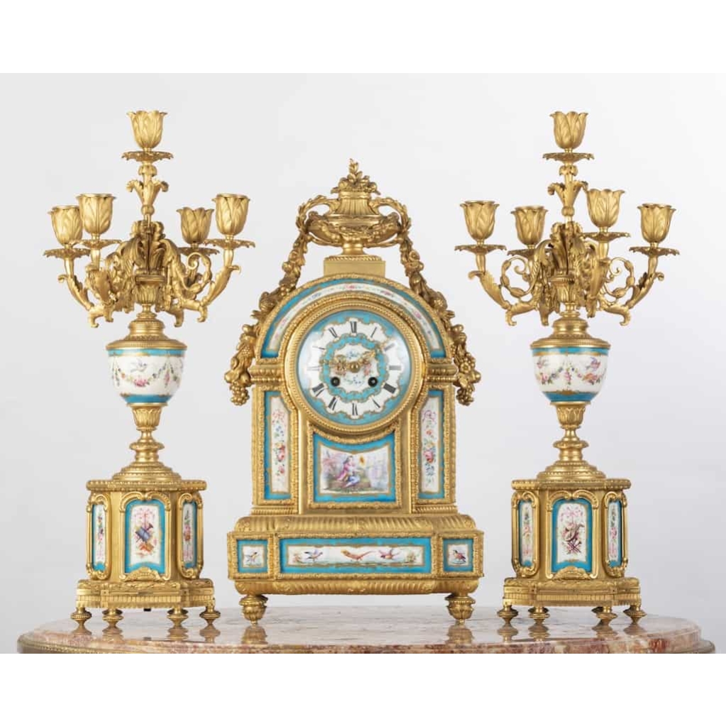 A French 19th Century Louis XVI St. Ormulu and Sèvres Porcelain Garniture. |||||||||