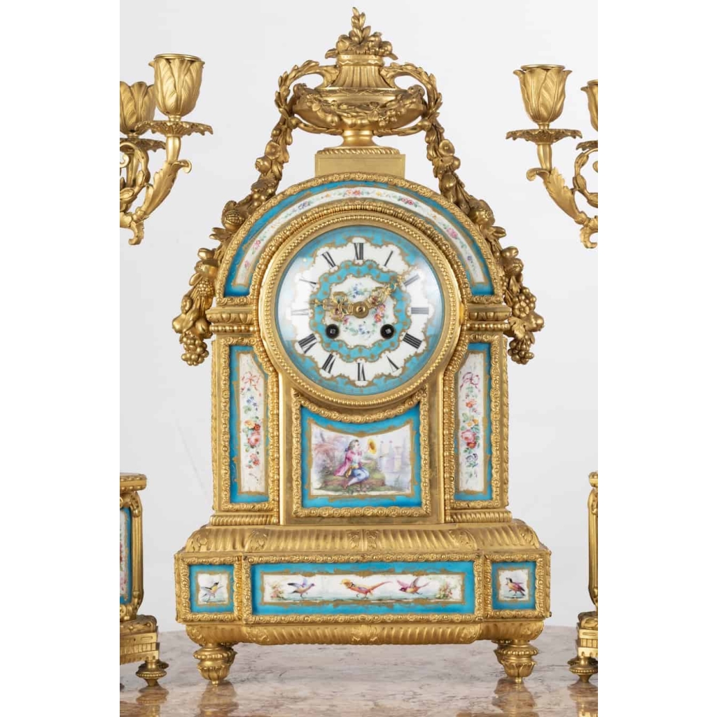 A French 19th Century Louis XVI St. Ormulu and Sèvres Porcelain Garniture. A French 19th Century Louis XVI St. Ormulu and Sèvres Porcelain Garniture.