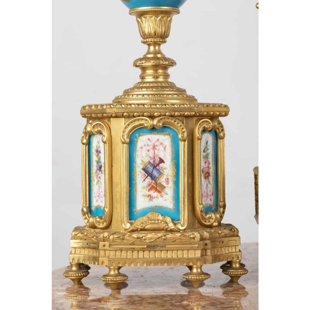 A French 19th Century Louis XVI St. Ormulu and Sèvres Porcelain Garniture. A French 19th Century Louis XVI St. Ormulu and Sèvres Porcelain Garniture.