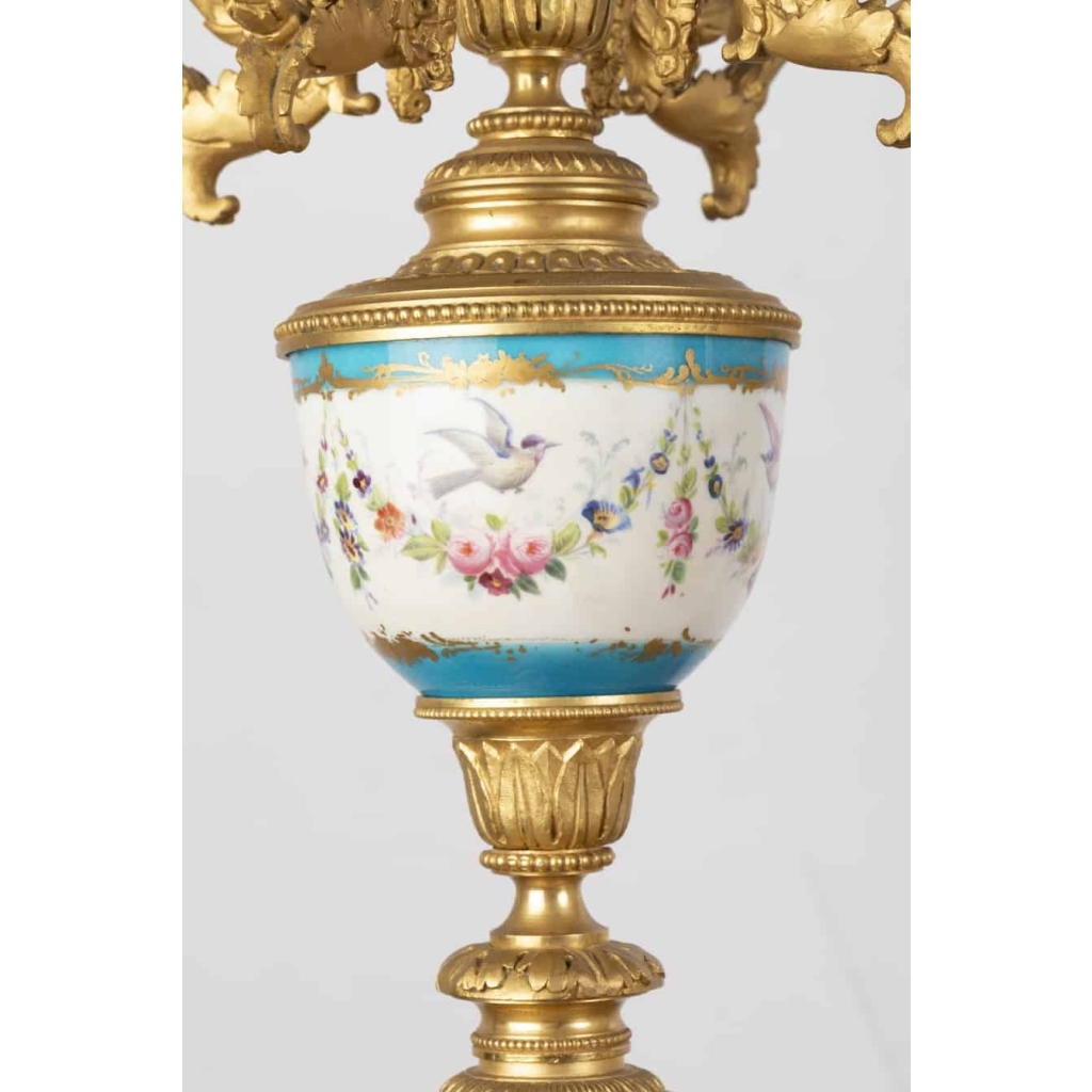 A French 19th Century Louis XVI St. Ormulu and Sèvres Porcelain Garniture. A French 19th Century Louis XVI St. Ormulu and Sèvres Porcelain Garniture.