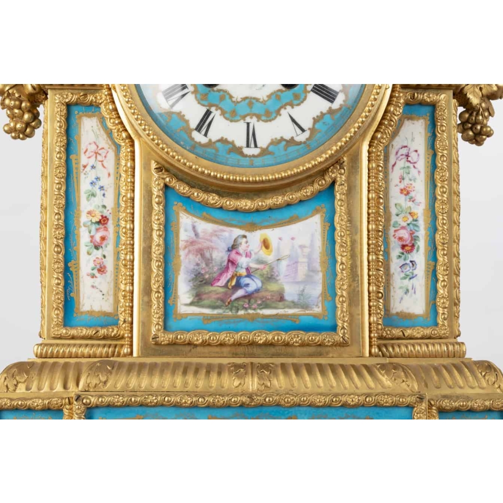 A French 19th Century Louis XVI St. Ormulu and Sèvres Porcelain Garniture. A French 19th Century Louis XVI St. Ormulu and Sèvres Porcelain Garniture.