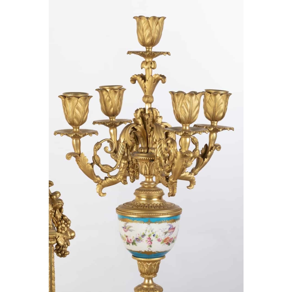 A French 19th Century Louis XVI St. Ormulu and Sèvres Porcelain Garniture. A French 19th Century Louis XVI St. Ormulu and Sèvres Porcelain Garniture.