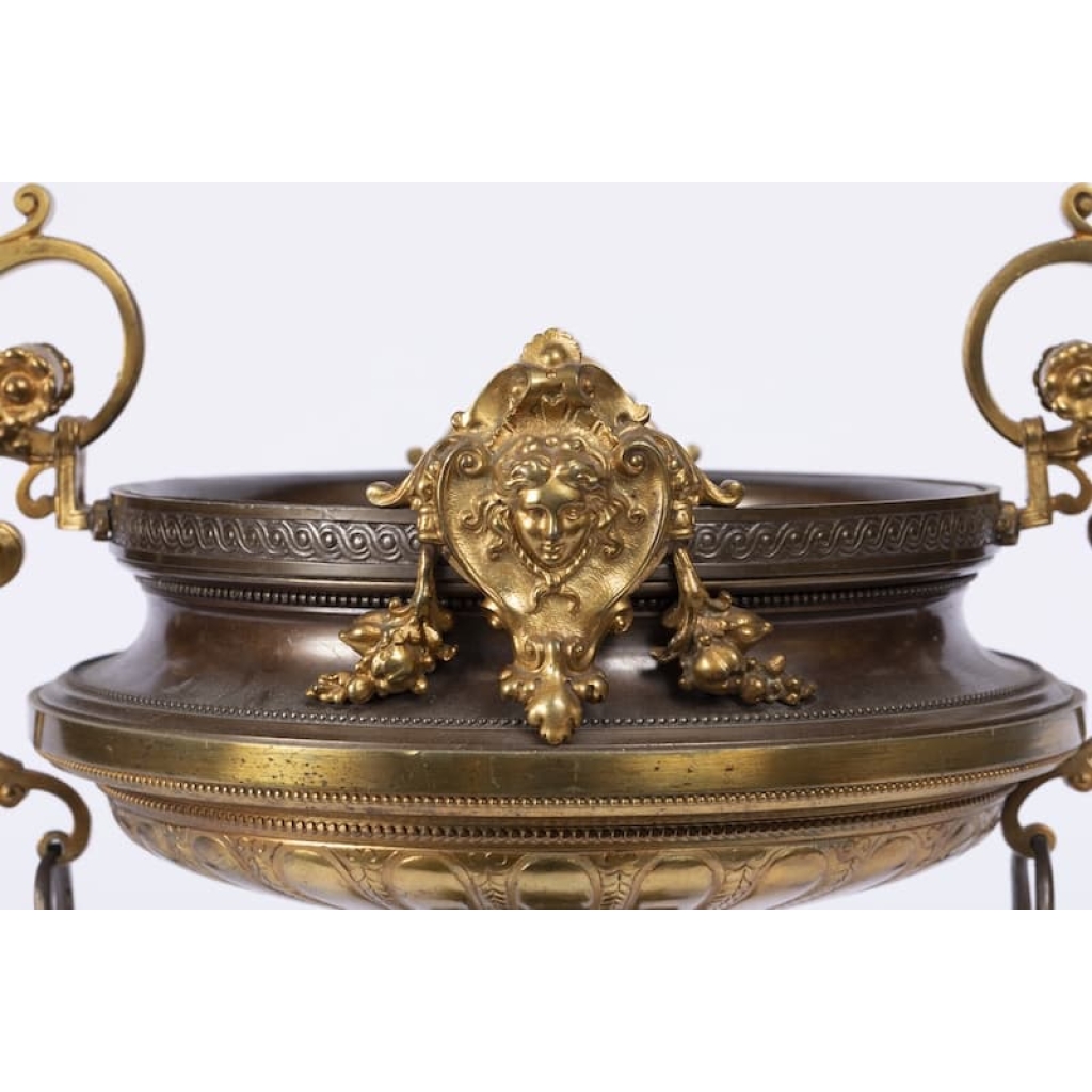 A French 19th Century Napoléon III Ormulu and Patinated Bronze Centerpiece. A French 19th Century Napoléon III Ormulu and Patinated Bronze Centerpiece.