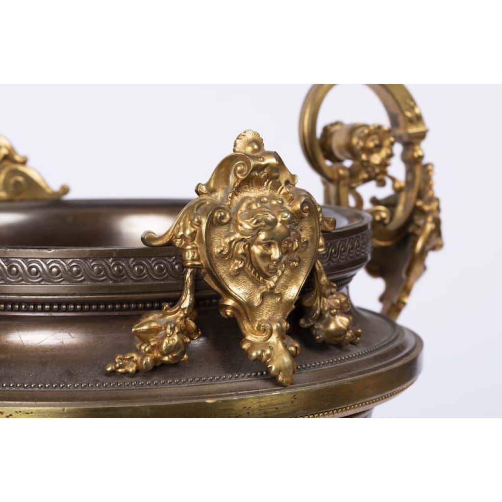 A French 19th Century Napoléon III Ormulu and Patinated Bronze Centerpiece. A French 19th Century Napoléon III Ormulu and Patinated Bronze Centerpiece.