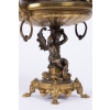 A French 19th Century Napoléon III Ormulu and Patinated Bronze Centerpiece. A French 19th Century Napoléon III Ormulu and Patinated Bronze Centerpiece.