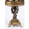 A French 19th Century Napoléon III Ormulu and Patinated Bronze Centerpiece. A French 19th Century Napoléon III Ormulu and Patinated Bronze Centerpiece.