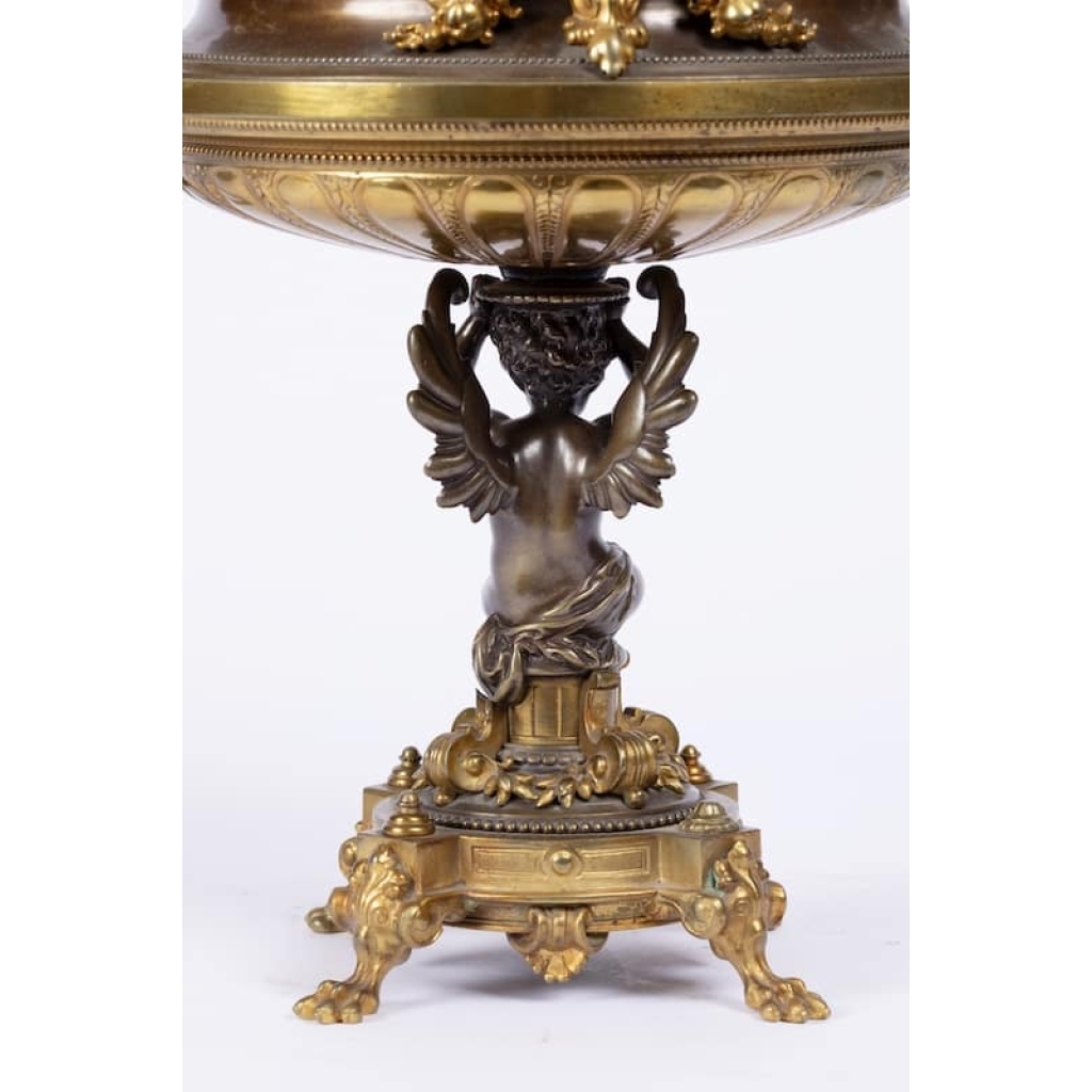 A French 19th Century Napoléon III Ormulu and Patinated Bronze Centerpiece. A French 19th Century Napoléon III Ormulu and Patinated Bronze Centerpiece.