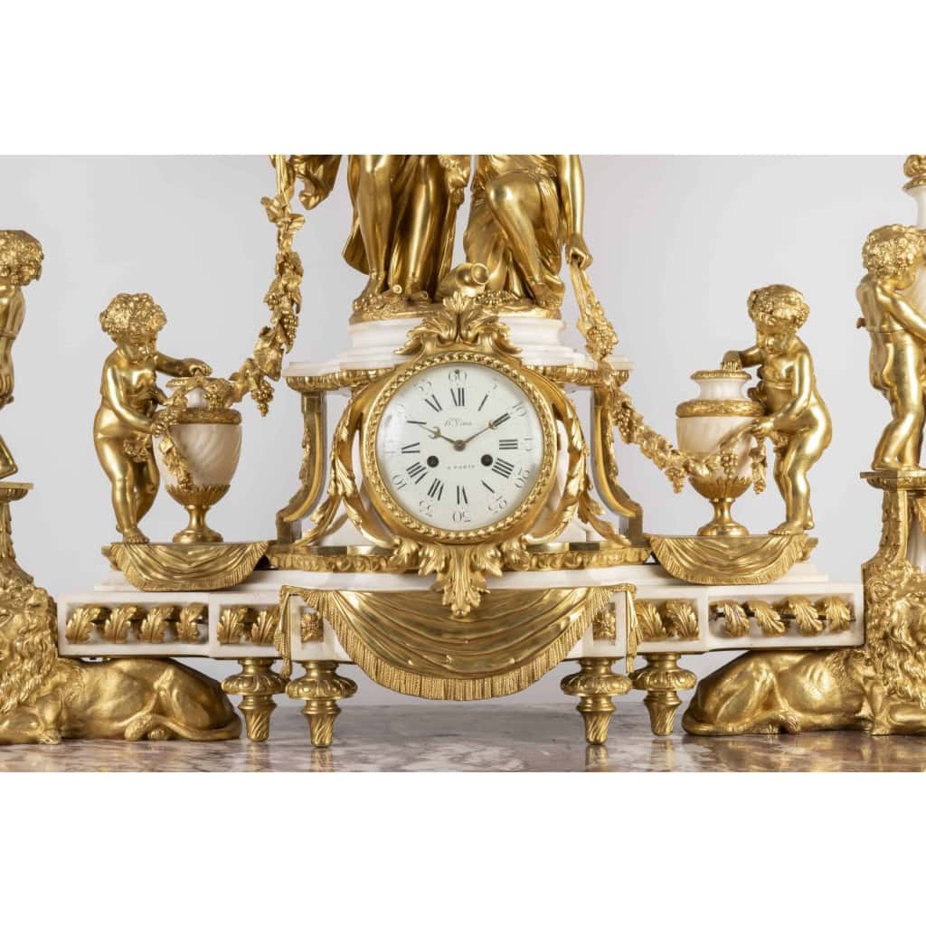 A Monumental Napoleon III Ormulu and white Marble Clock Set by Henri Vian (1860-1905) A Monumental Napoleon III Ormulu and white Marble Clock Set by Henri Vian (1860-1905)