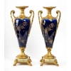 Garniture en porcelaine bleu, décor fleurs monture en bronze dorée signé Royal Bonn Garniture en porcelaine bleu, décor fleurs monture en bronze dorée signé Royal Bonn