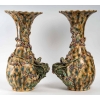 Paire de vases en barbotine à décor d'époque, XIXème siècle Paire de vases en barbotine à décor d'époque, XIXème siècle