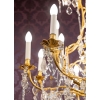 Lustre en bronze doré à 16 bras de lumière et 12 fleurettes en cristal éclairées, XIXème siècle Lustre en bronze doré à 16 bras de lumière et 12 fleurettes en cristal éclairées, XIXème siècle