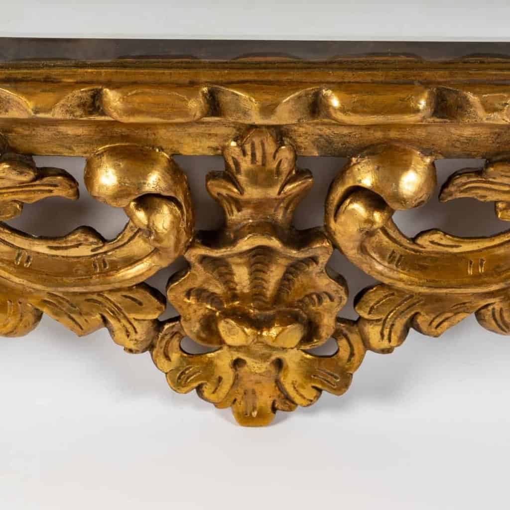 Miroir italien en bois sculpté et doré, XIXème siècle Miroir italien en bois sculpté et doré, XIXème siècle