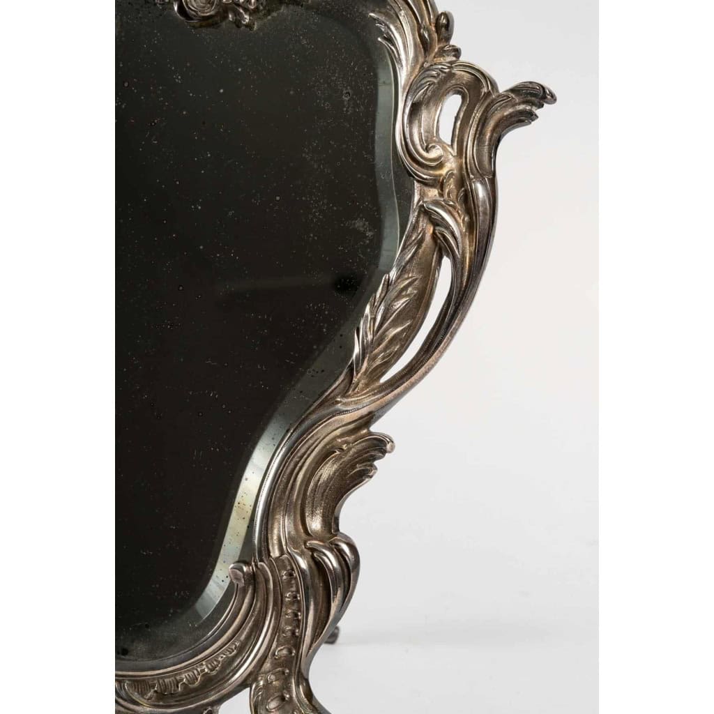 Miroir de table en bronze argenté, glace bisauté au mercure, XIXème siècle Miroir de table en bronze argenté, glace bisauté au mercure, XIXème siècle