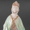 Statuette en porcelaine à couverte émaillée blanc et turquoise, intitulée "Princesse Irène", signée Mougin, Nancy, début du XXe siècle. Statuette en porcelaine à couverte émaillée blanc et turquoise, intitulée "Princesse Irène", signée Mougin, Nancy, début du XXe siècle.