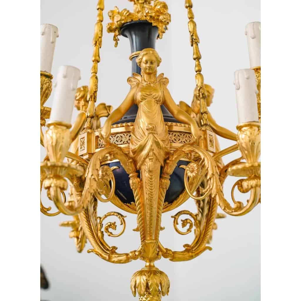 Lustre en bronze doré et métal patiné dit "aux Termes" fin XIXème Siècle Lustre en bronze doré et métal patiné dit "aux Termes" fin XIXème Siècle