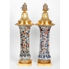 Paire de Vases en Porcelaine montés en Lampes par Gagneau Paris XIXème Siècle Paire de Vases en Porcelaine montés en Lampes par Gagneau Paris XIXème Siècle