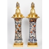 Paire de Vases en Porcelaine montés en Lampes par Gagneau Paris XIXème Siècle Paire de Vases en Porcelaine montés en Lampes par Gagneau Paris XIXème Siècle