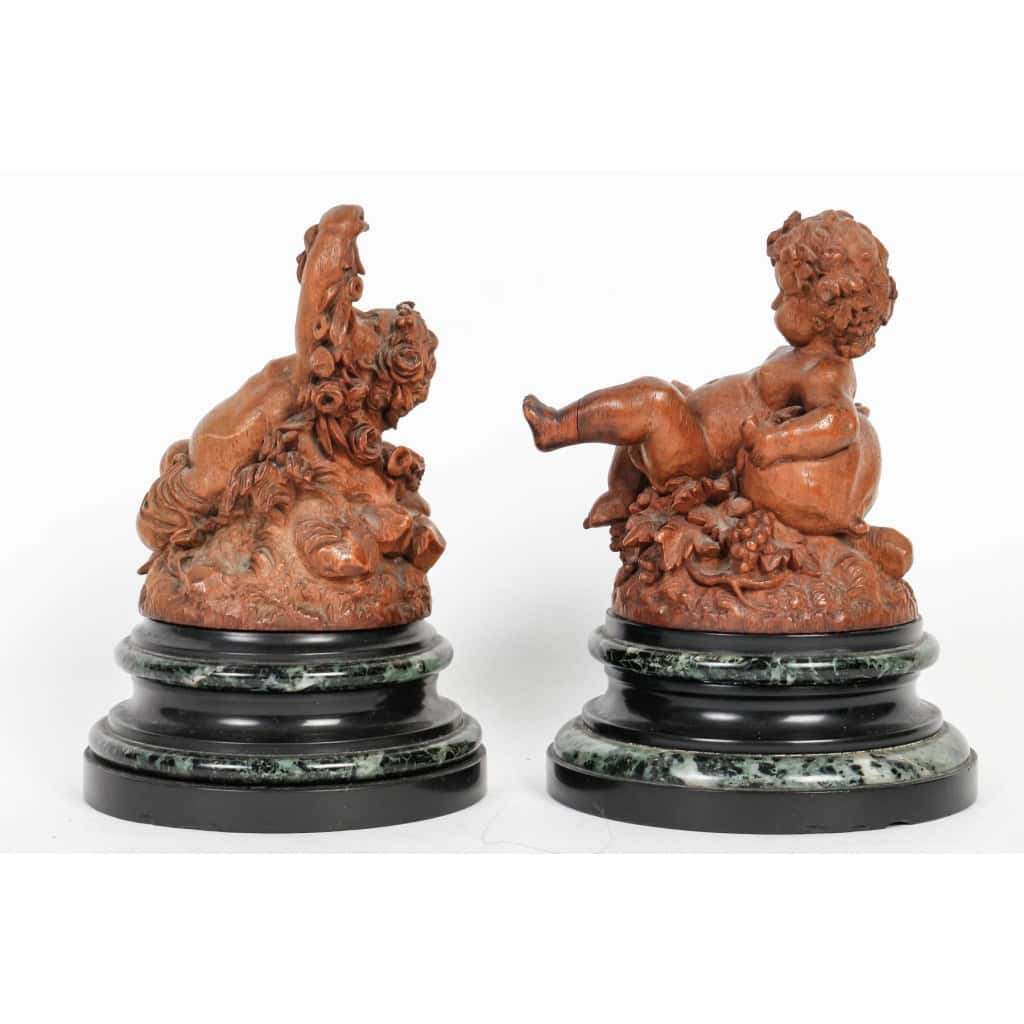 Les Enfants de Bacchus, Paire de Putti en bois sculpté XIXème Siècle Les Enfants de Bacchus, Paire de Putti en bois sculpté XIXème Siècle