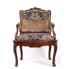 Fauteuil à fond de cannes en bois naturel mouluré et sculpté d’époque Régence vers 1720 Fauteuil à fond de cannes en bois naturel mouluré et sculpté d’époque Régence vers 1720