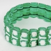 Bracelet "Muguet" verre vert émeraude émaillé blanc de René LALIQUE Bracelet "Muguet" verre vert émeraude émaillé blanc de René LALIQUE