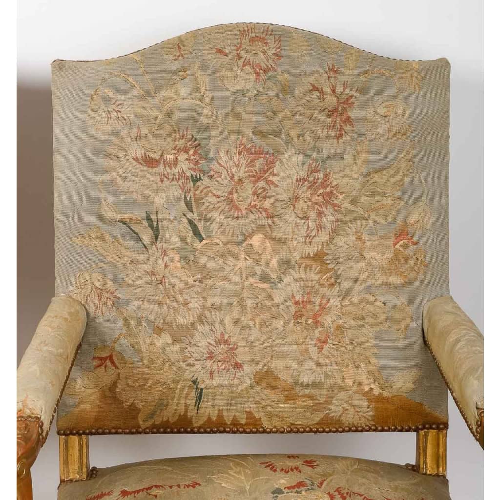 Une paire de fauteuils de style régence en bois doré fin XIXème siècle Une paire de fauteuils de style régence en bois doré fin XIXème siècle