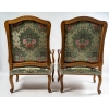 Époque Régence vers 1720 Paire de larges fauteuils en noyer mouluré et sculpté Époque Régence vers 1720 Paire de larges fauteuils en noyer mouluré et sculpté