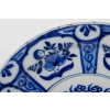 Plat en faïence de Delft en camaïeu de bleu à décor de fleurs XVIIIème siècle Plat en faïence de Delft en camaïeu de bleu à décor de fleurs XVIIIème siècle