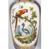 Paire de vases en porcelaine à décor d'oiseaux exotiques, travail français du début du XIXe siècle Paire de vases en porcelaine à décor d'oiseaux exotiques, travail français du début du XIXe siècle