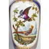 Paire de vases en porcelaine à décor d'oiseaux exotiques, travail français du début du XIXe siècle Paire de vases en porcelaine à décor d'oiseaux exotiques, travail français du début du XIXe siècle