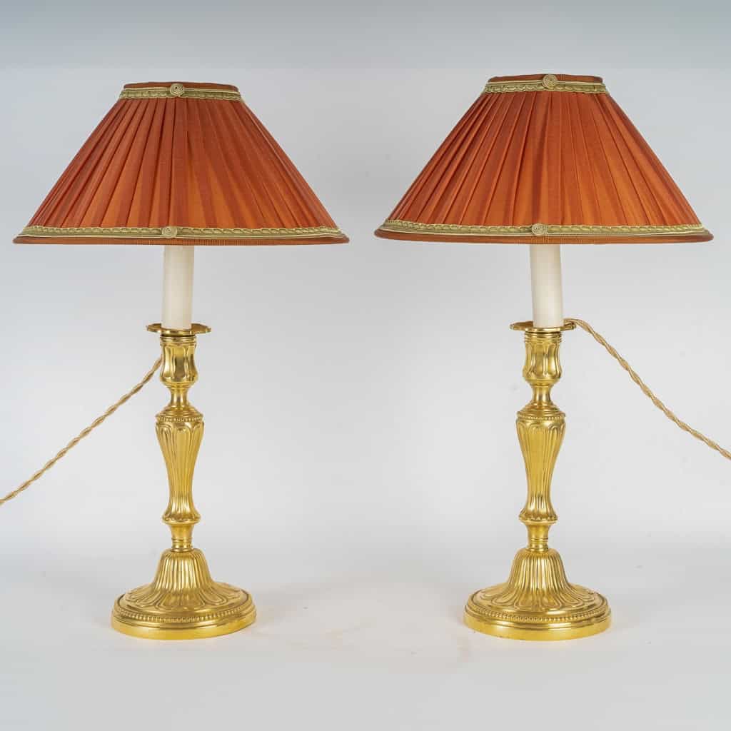 Paire de flambeaux en bronze ciselé et doré montés en lampes d’époque Louis XVI MLD Antiquités|MLD Antiquités|MLD Antiquités|MLD Antiquités|MLD Antiquités|MLD Antiquités|MLD Antiquités||