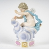 Figurine en porcelaine de la manufacture de Meissen, série des anges à devise dite Devisenkinder, XIXe siècle Figurine en porcelaine de la manufacture de Meissen, série des anges à devise dite Devisenkinder, XIXe siècle