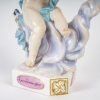 Figurine en porcelaine de la manufacture de Meissen, série des anges à devise dite Devisenkinder, XIXe siècle Figurine en porcelaine de la manufacture de Meissen, série des anges à devise dite Devisenkinder, XIXe siècle