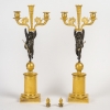 Paire de candélabres d’époque Empire en bronze à décor d’Amours ailés vers 1810-1815 Paire de candélabres d’époque Empire en bronze à décor d’Amours ailés vers 1810-1815