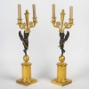 Paire de candélabres d’époque Empire en bronze à décor d’Amours ailés vers 1810-1815 Paire de candélabres d’époque Empire en bronze à décor d’Amours ailés vers 1810-1815