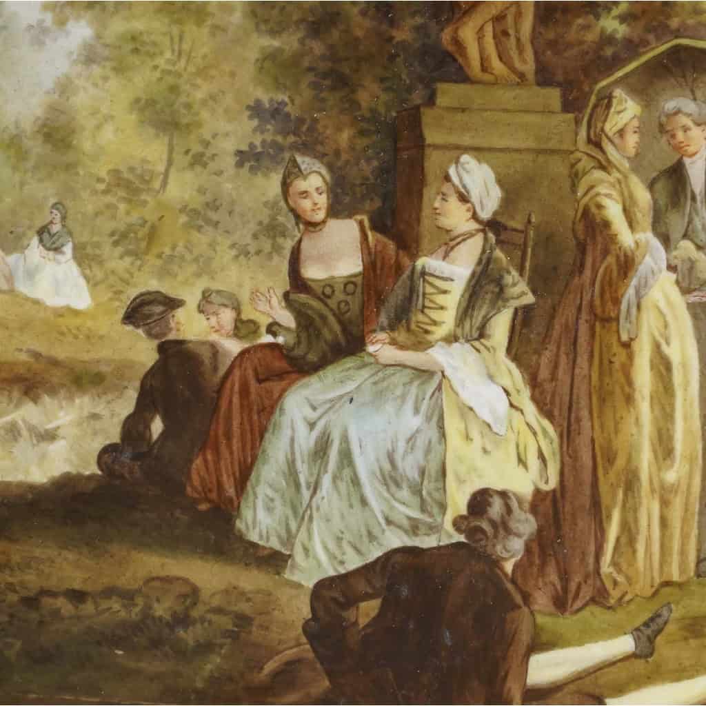 Scène galante, peinte sur porcelaine, signée G.M, travail français du XIXe siècle dans le goût de Watteau. Scène galante, peinte sur porcelaine, signée G.M, travail français du XIXe siècle dans le goût de Watteau.