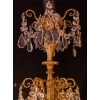 Lustre à vingt-quatre bras de lumières en bronze ciselé et doré et décor de cristal Baccarat vers 1880 Lustre à vingt-quatre bras de lumières en bronze ciselé et doré et décor de cristal Baccarat vers 1880