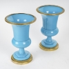 Pair de vase en Opaline turquoise monture en bronze doré avec un coupe au milieu d’époque Charles X Pair de vase en Opaline turquoise monture en bronze doré avec un coupe au milieu d’époque Charles X