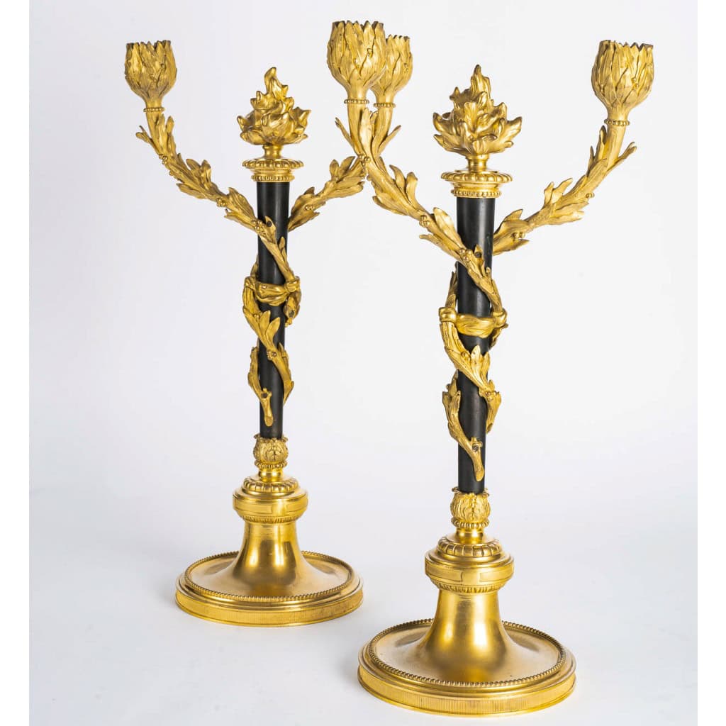 Paire de candélabres de style Louis XVI en bronze patiné et doré vers 1880 