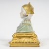 Superbe sculpture en biscuit, porcelaine et bronze doré représentant le buste d’une femme, porte le cachet de l’artiste Paul Louchet, période Art Nouveau, fin du XIXe siècle. 