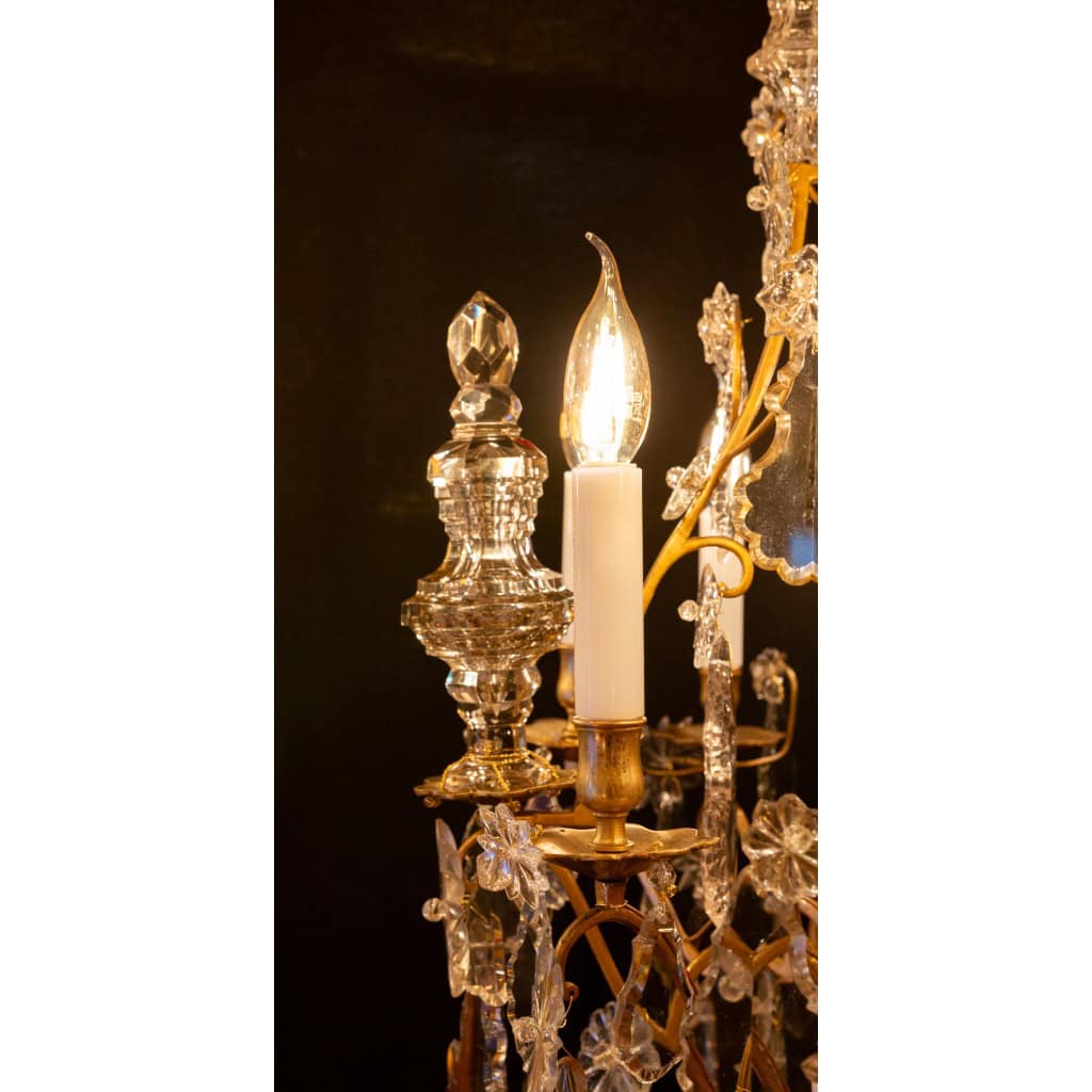 Lustre d’époque Louis XV en bronze doré à décor de poignards et plaquettes en cristal taillé vers 1760 