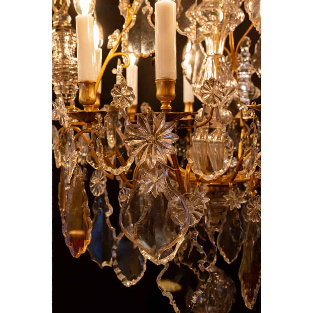 Lustre d’époque Louis XV en bronze doré à décor de poignards et plaquettes en cristal taillé vers 1760 