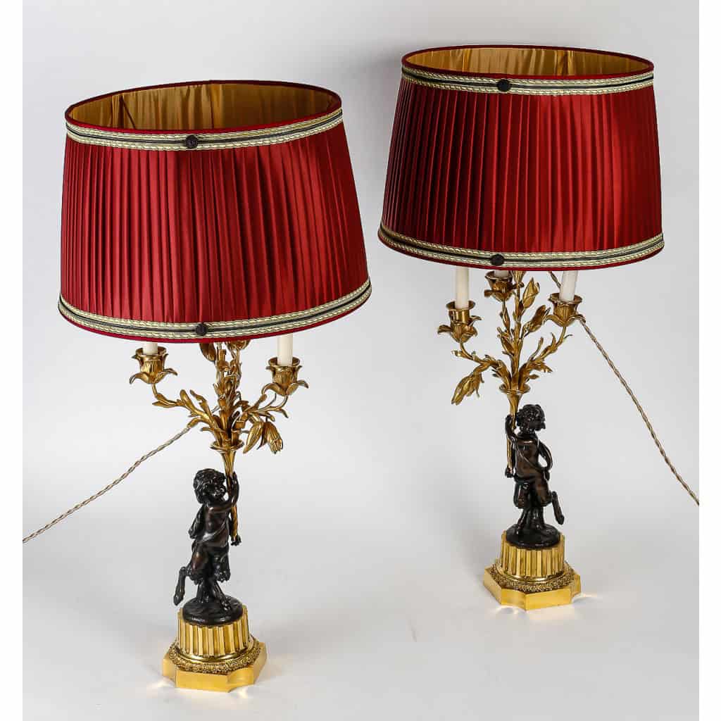 Paire de candélabres, montés en lampes, de style Louis XVI en bronze à décor de Faunes vers 1860-1880 