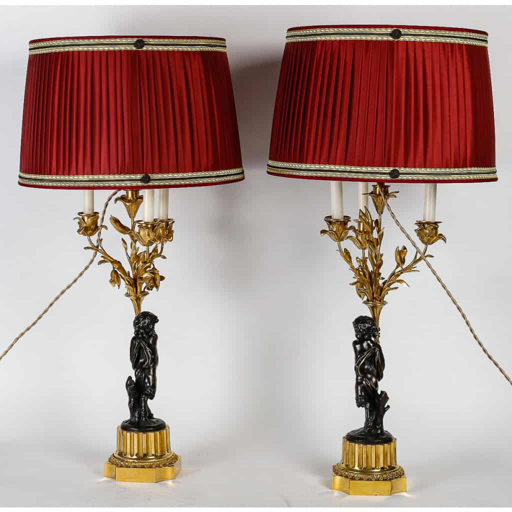 Paire de candélabres, montés en lampes, de style Louis XVI en bronze à décor de Faunes vers 1860-1880 