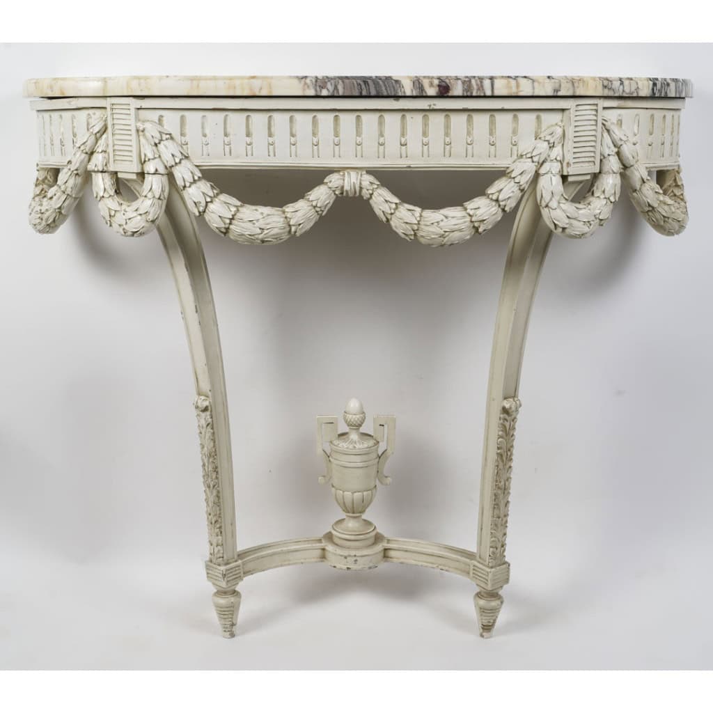 Paire de consoles de style Louis XVI. 