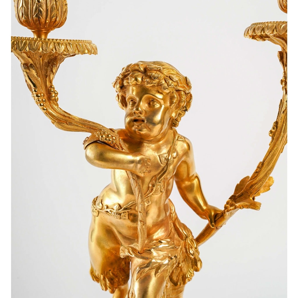 Paire de candélabres de style Louis XVI en bronze doré Amour et Faune d’après Clodion et Delarue vers 1850-1860 