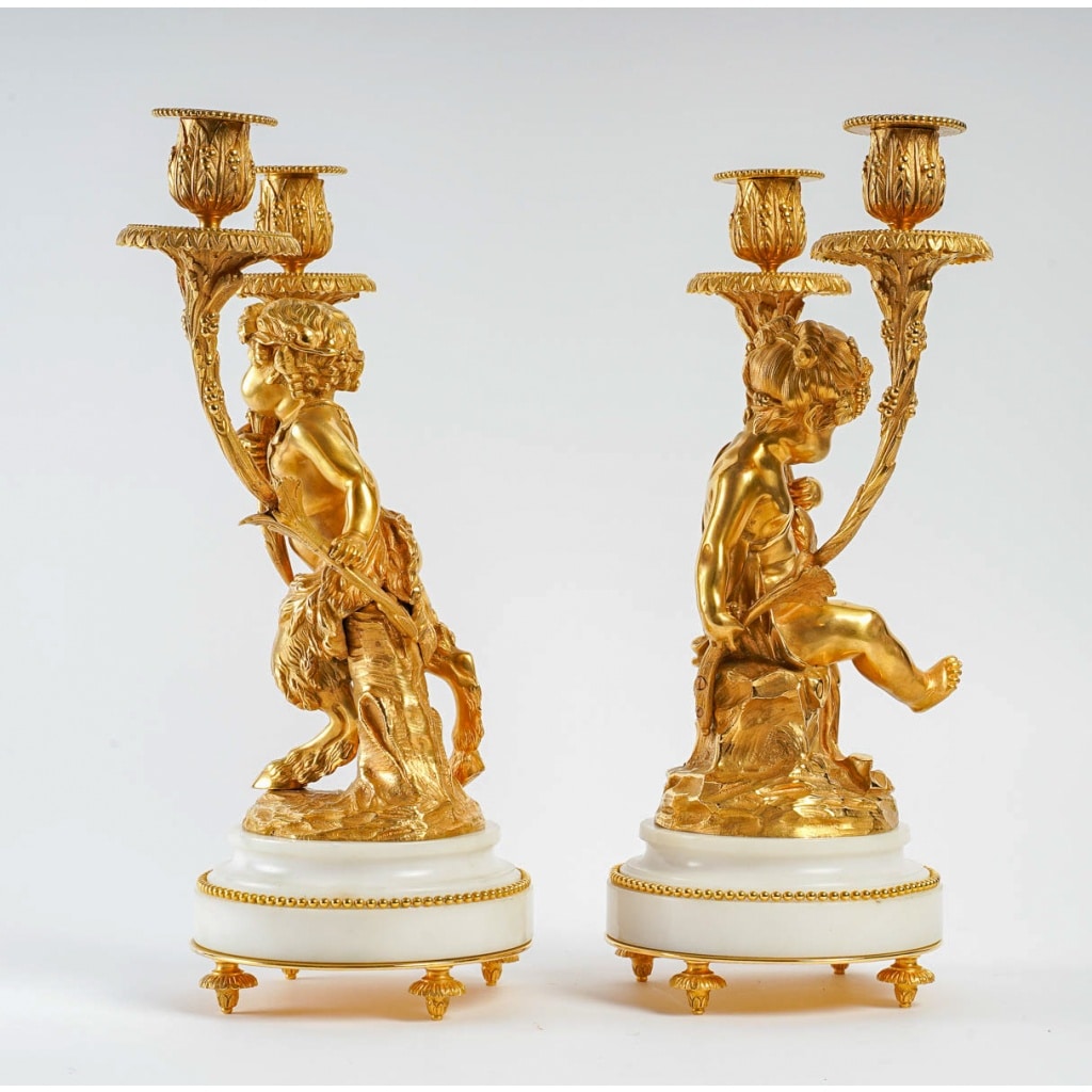 Paire de candélabres de style Louis XVI en bronze doré Amour et Faune d’après Clodion et Delarue vers 1850-1860 