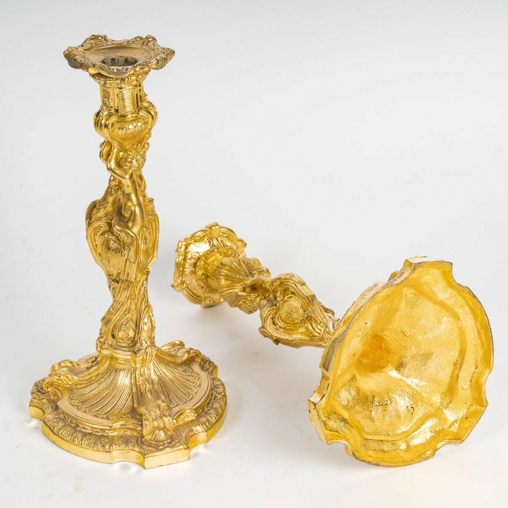 D’après Juste-Aurèle Meissonnier Paire de flambeaux en bronze ciselé et doré dans le style Louis XV Circa 1880 