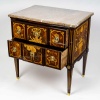 Commode sauteuse à ressaut à marqueterie d’instruments de musique, époque Louis XVI vers 1780 